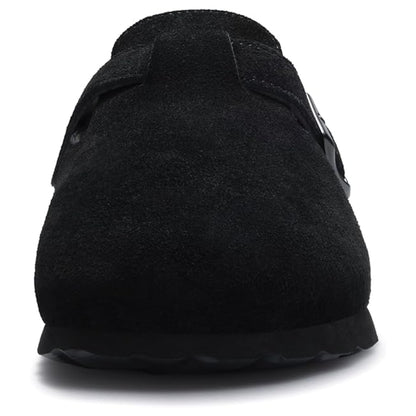 Black slip-on shoe on a white background