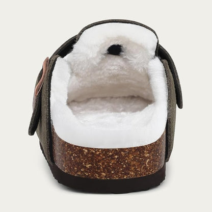 Brown and white slipper with cork-like sole on a light gray background